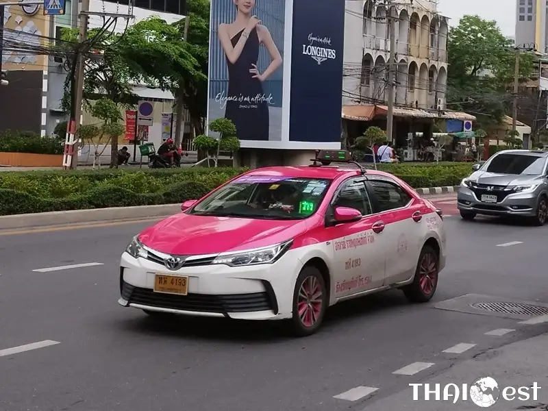 Pink/white taxi in Bangkok